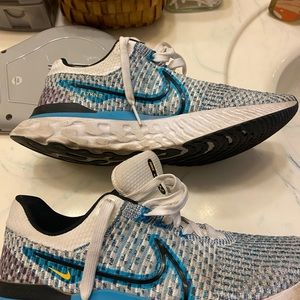 Nike react running shoes.  Worn only a handful of times